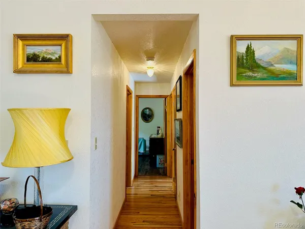 a view of a hallway with a small dining room