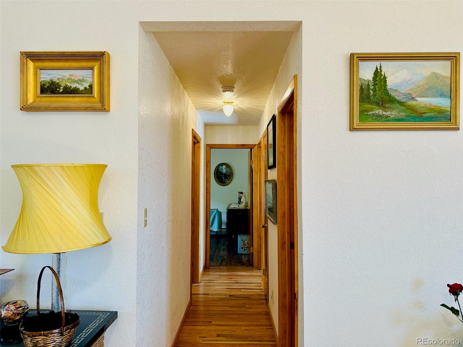 162 Cedar Ridge Road Mosca, CO 81146 - Photo 7 of 24 a view of a hallway with a small dining room