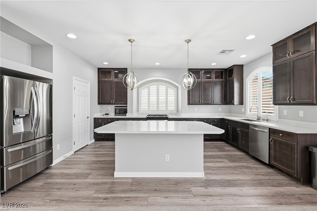 6316 Rock Strm Lane Las Vegas, NV 89141 - Photo 20 of 72 Stainless steel refrigerator. Upgraded kitchen cabinetry. Pantry.