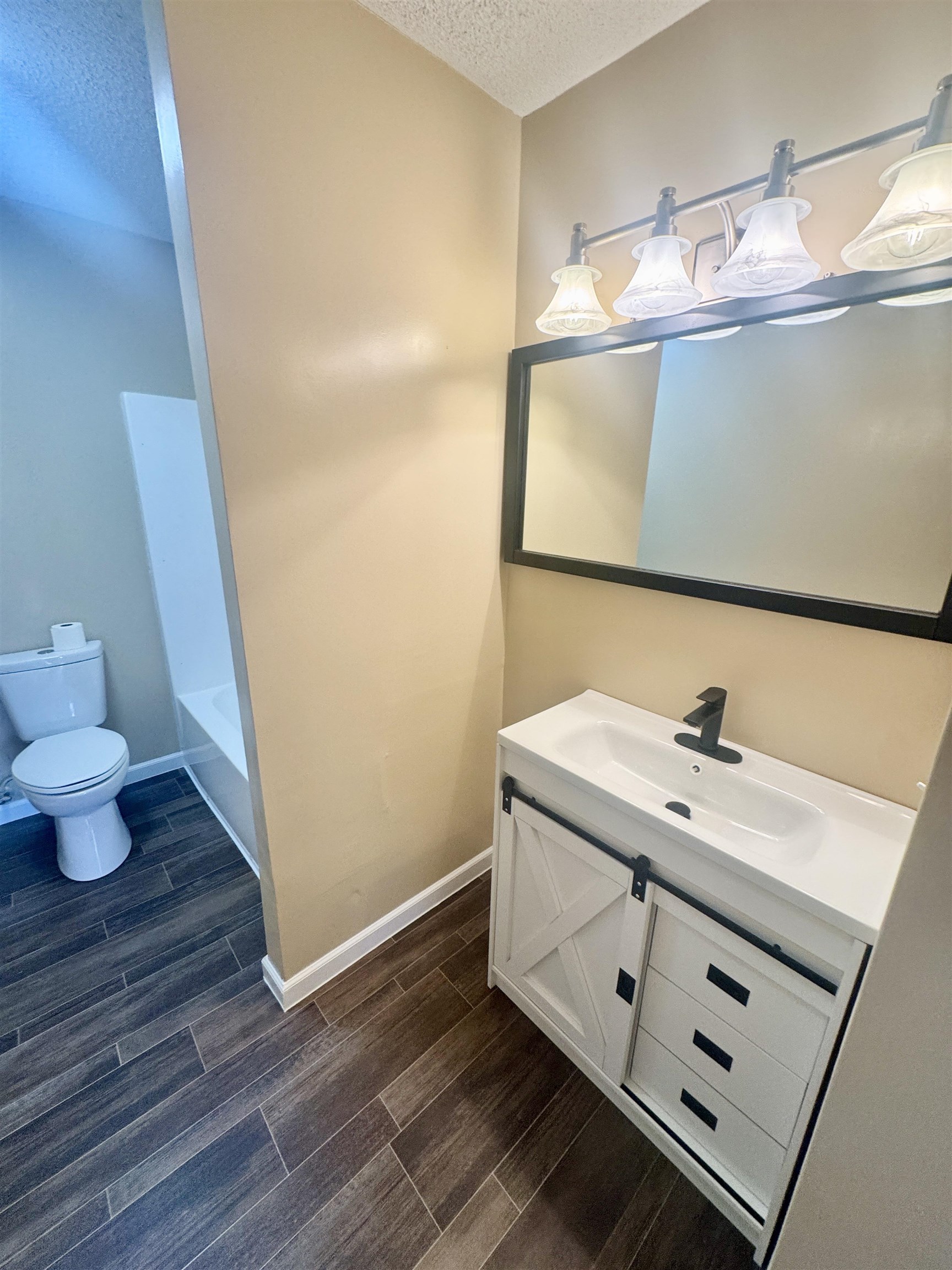 250 Dr Lewis Road Ripley, TN 38063 - Photo 13 of 18 a bathroom with a sink and a mirror