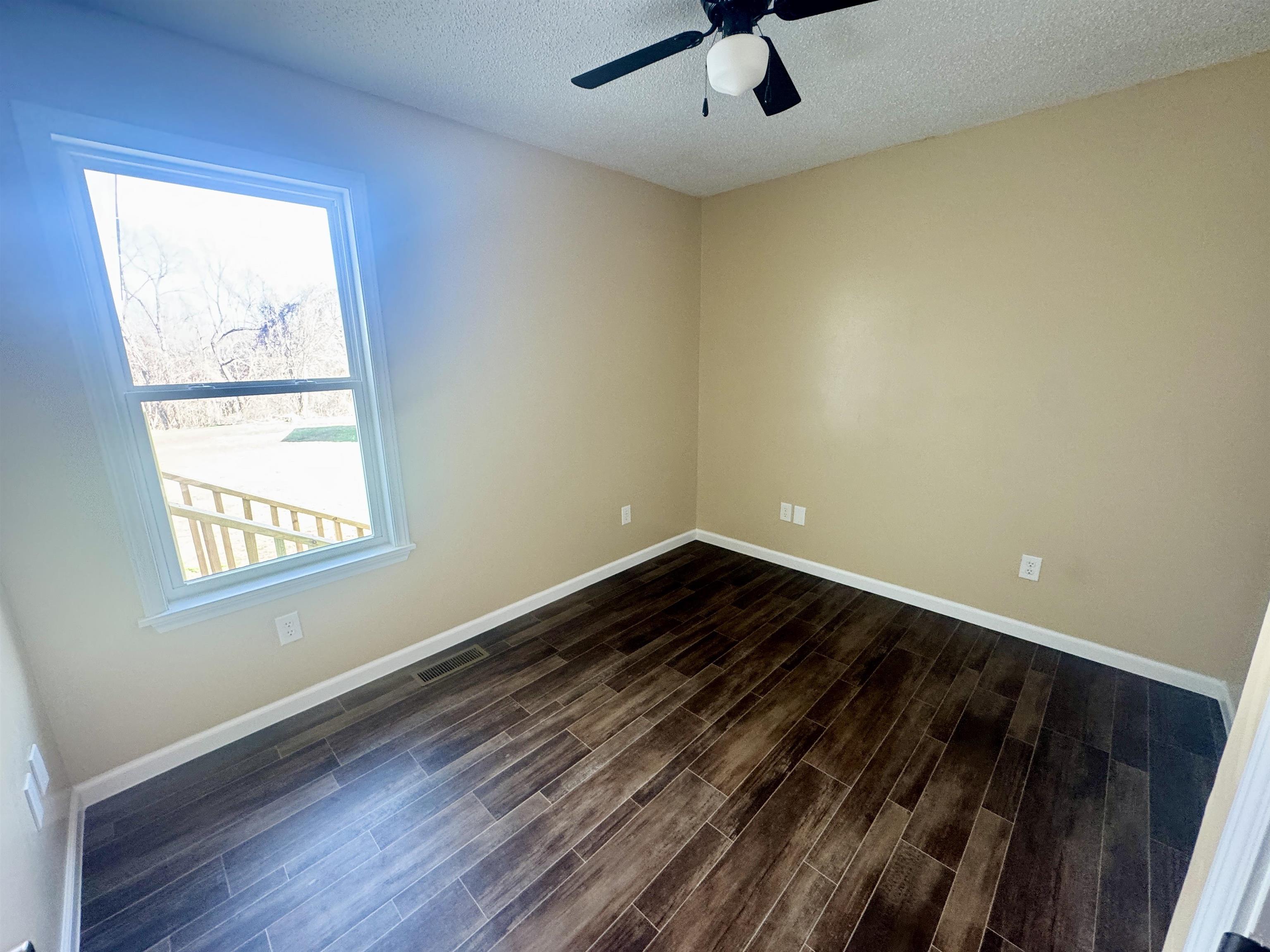 250 Dr Lewis Road Ripley, TN 38063 - Photo 17 of 18 an empty room with a window