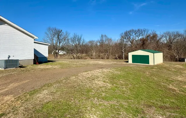 a house with trees in front of it