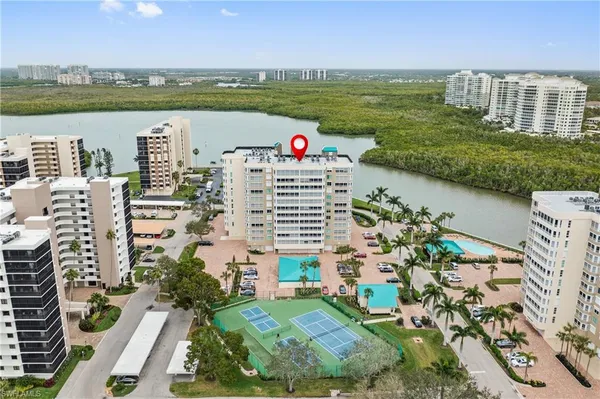 a view of lake with yard
