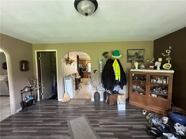 a view of a dining room with furniture and window