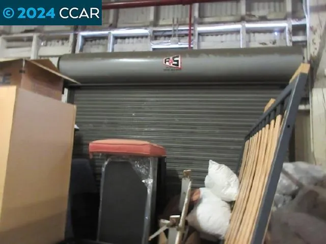 a view of kitchen with stainless steel appliances