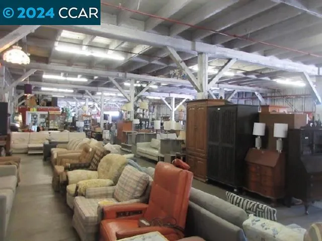 a media room with lots of chairs and a table