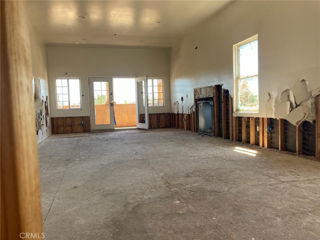 14733 Juniper Street Hesperia, CA 92345 - Photo 2 of 9 a view of a livingroom with furniture and windows