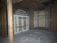 14733 Juniper Street Hesperia, CA 92345 - Photo 3 of 9 a view of entryway with a wooden door