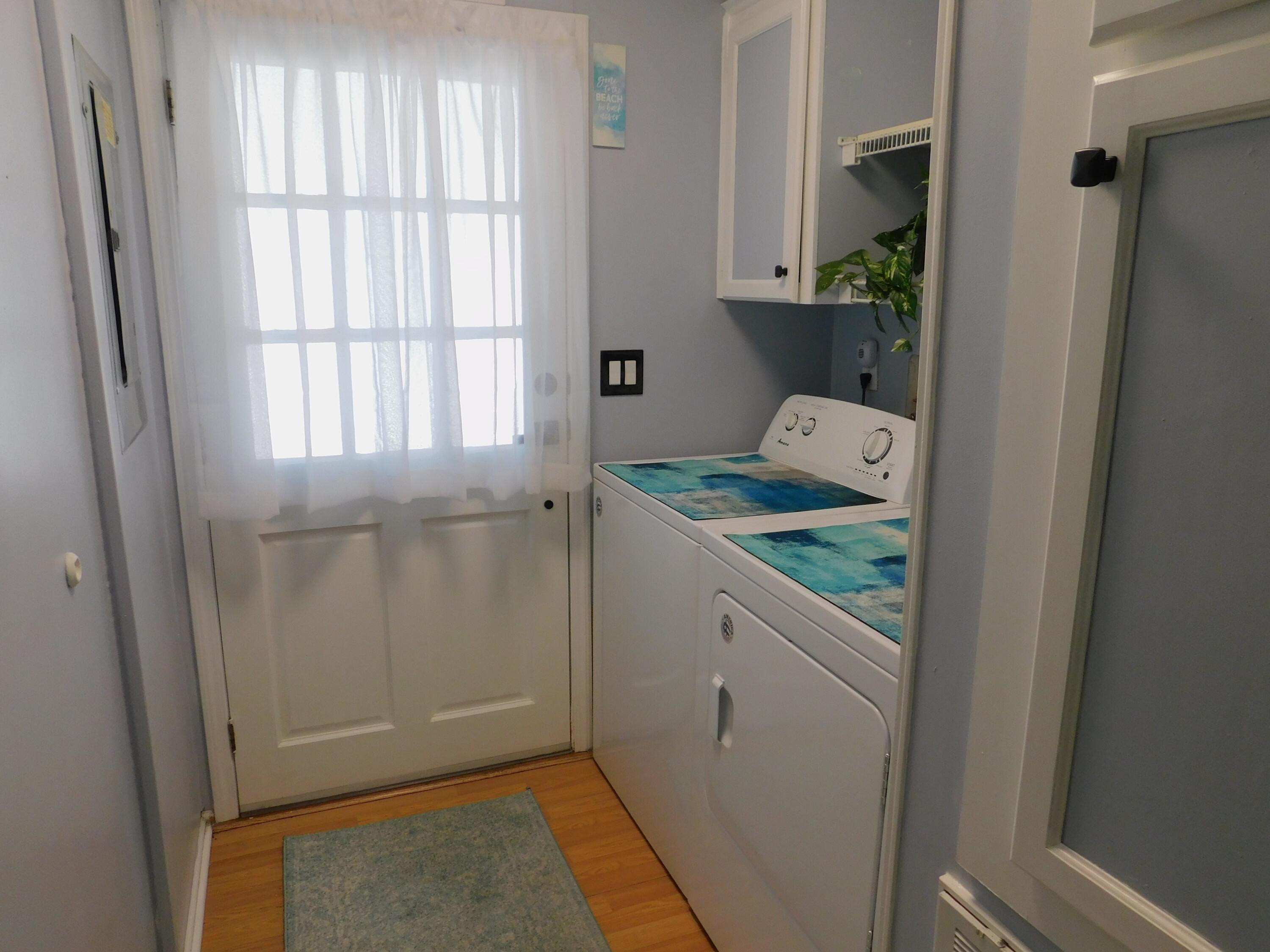 376 Seahorse Terrace Fort Pierce, FL 34982 - Photo 11 of 16 a room with window and cabinets