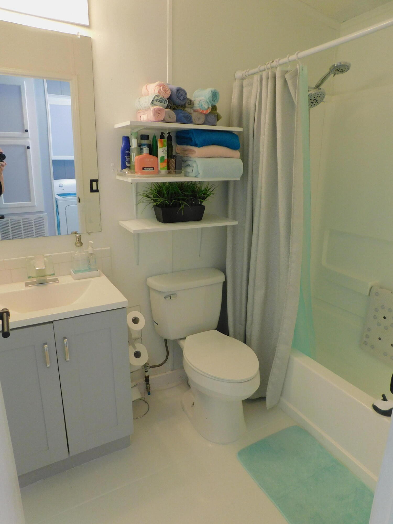 376 Seahorse Terrace Fort Pierce, FL 34982 - Photo 12 of 16 a bathroom with a sink toilet and shower
