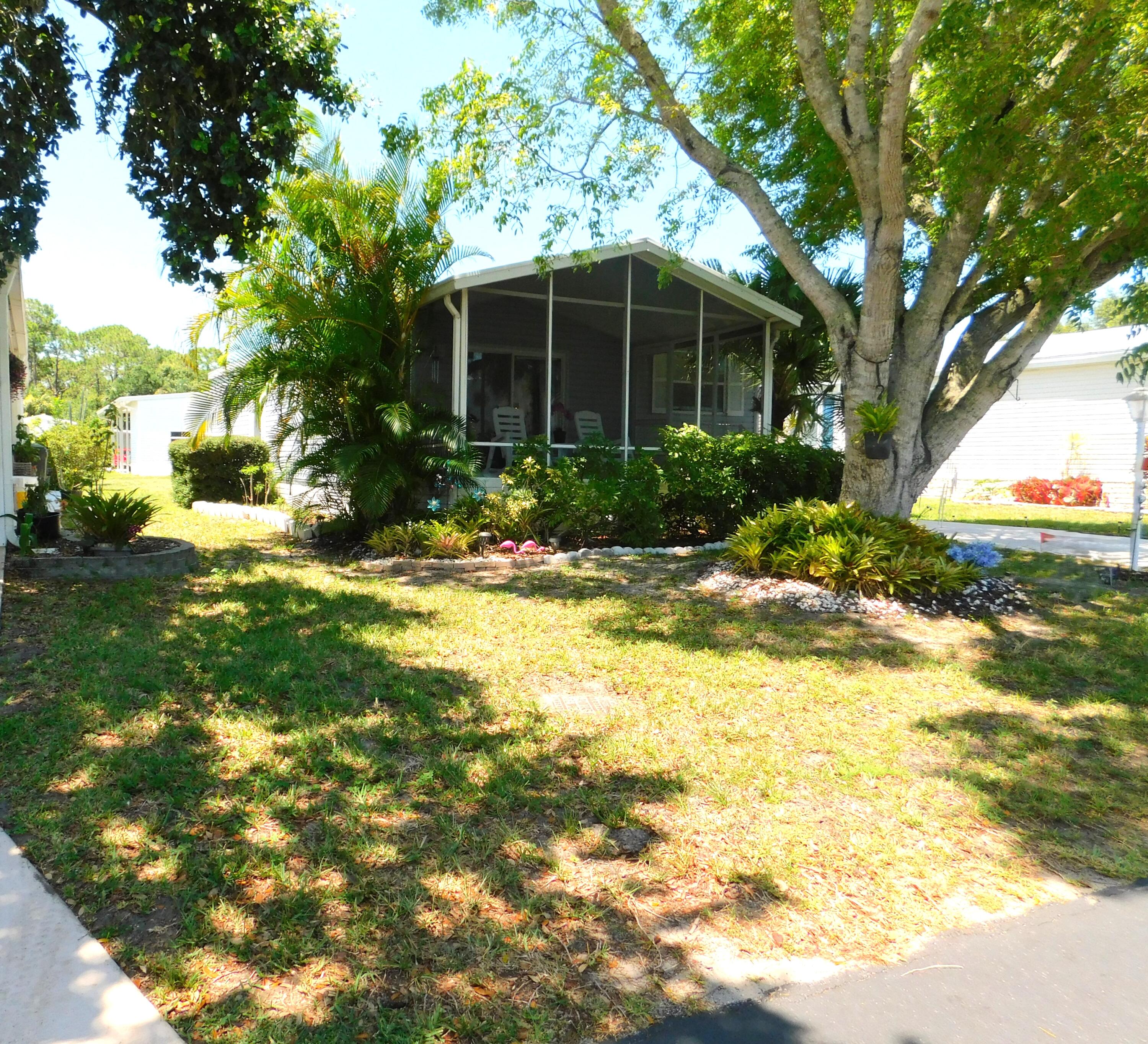 376 Seahorse Terrace Fort Pierce, FL 34982 - Photo 2 of 16 a view of house with yard