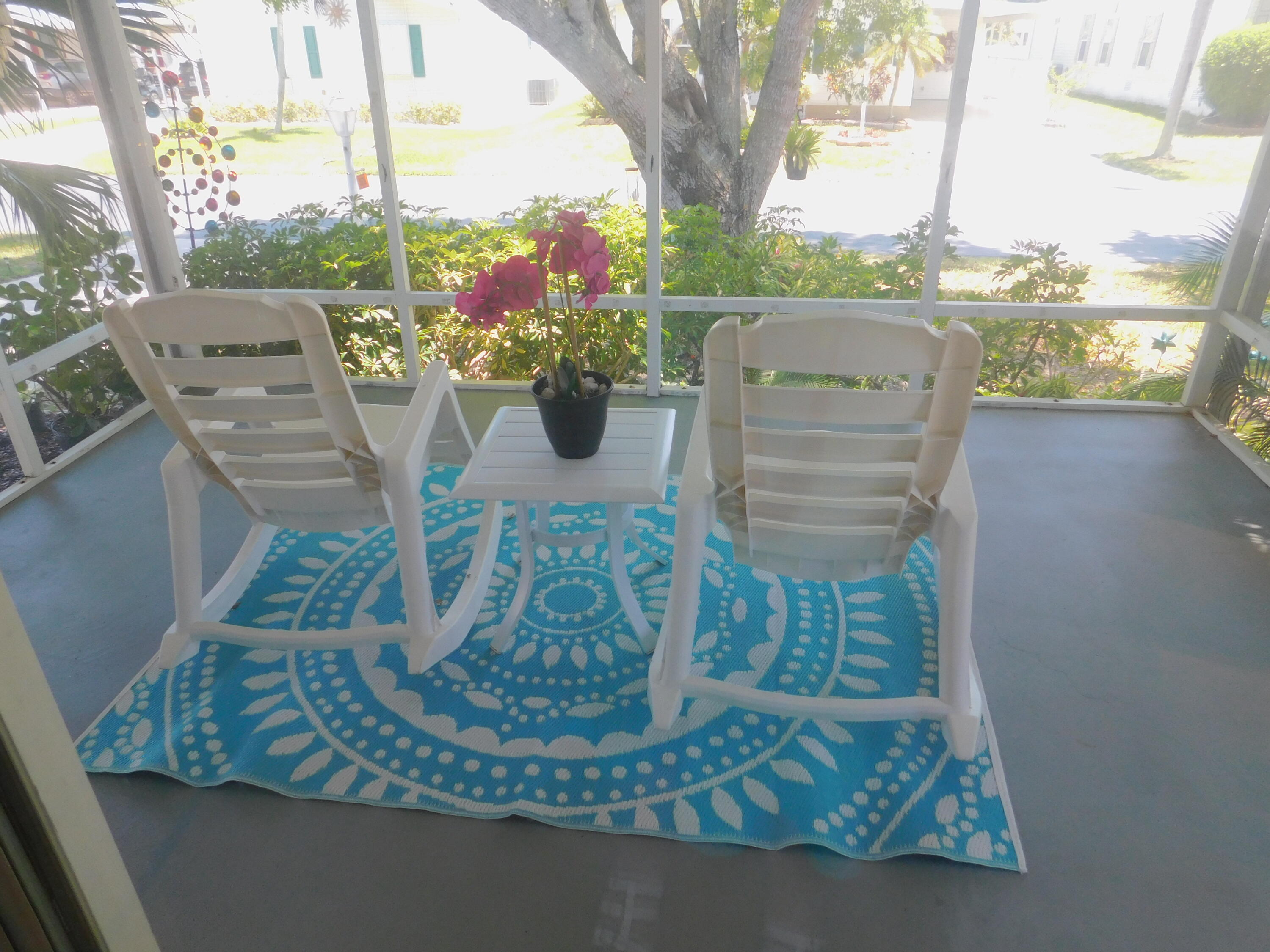 376 Seahorse Terrace Fort Pierce, FL 34982 - Photo 9 of 16 a view of a dining table with chairs