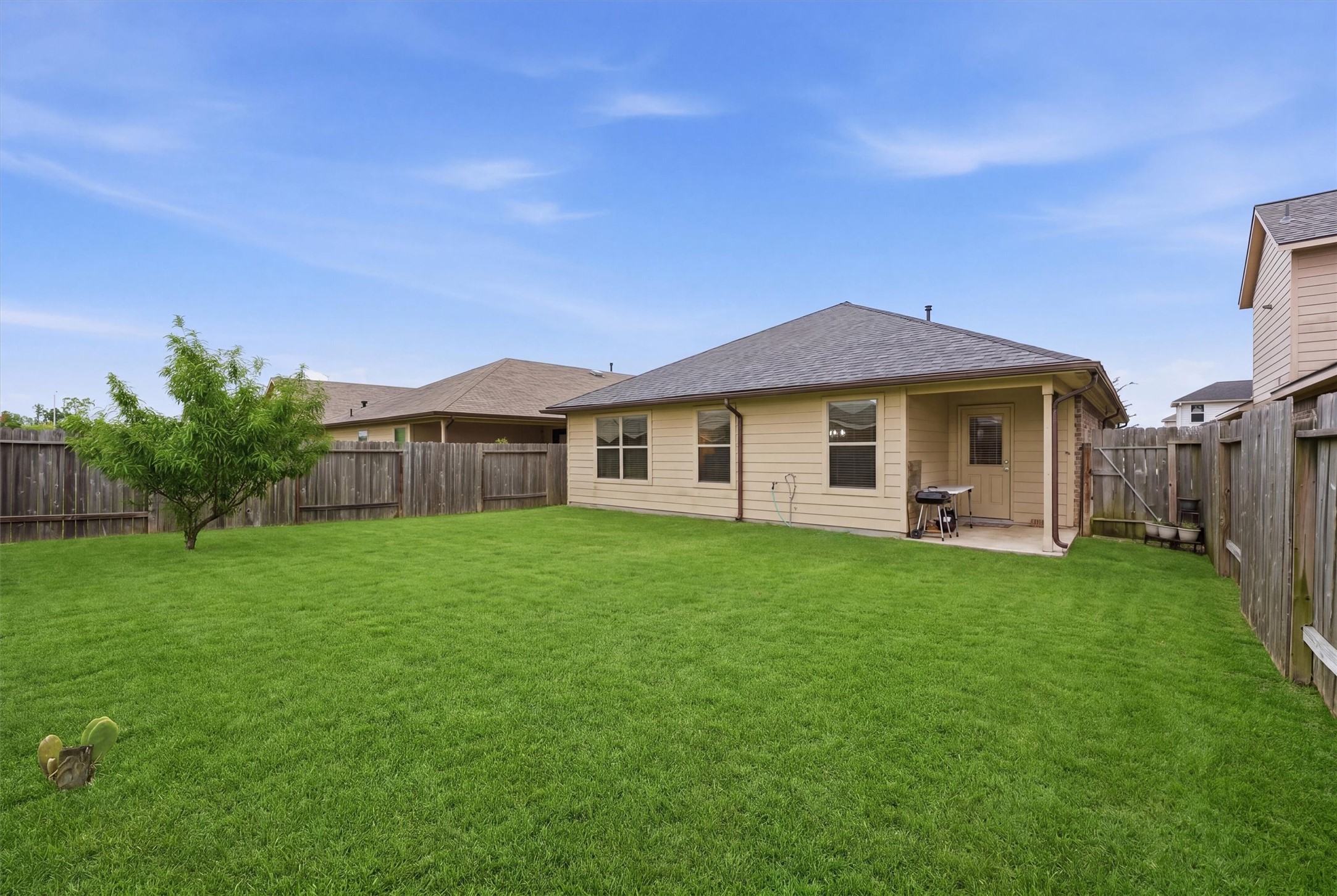 15455 Rancho Joya Way Houston, TX 77049 - Photo 20 of 20 a front view of a house with a garden