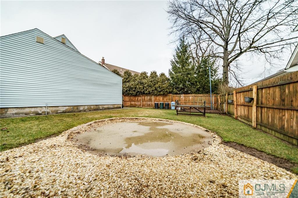 369 Amherst Road Linden, NJ 07036 - Photo 22 of 23 a view of a backyard with a garden
