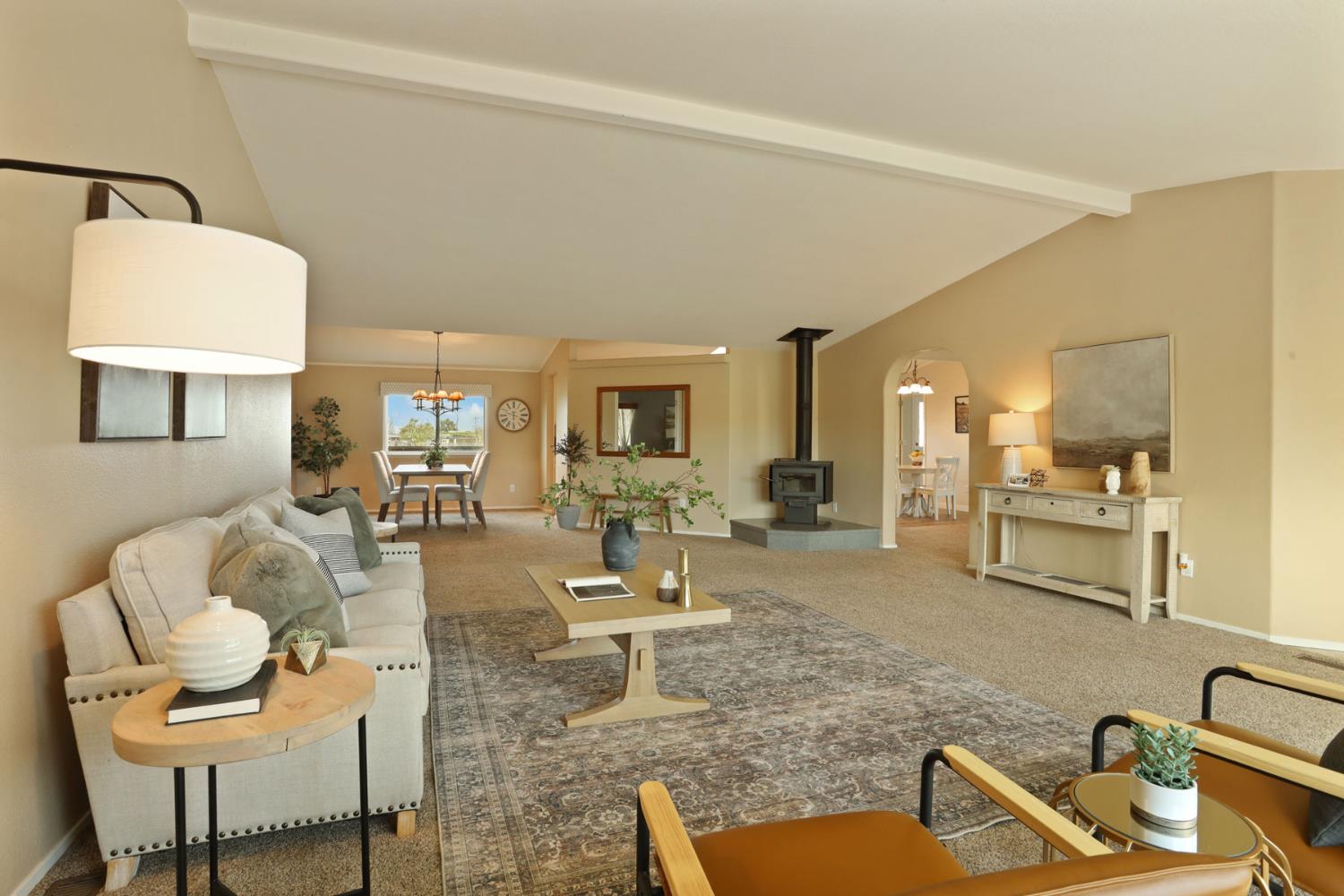 3320 Durham Ferry Road Tracy, CA 95304 - Photo 12 of 77 a living room with furniture and a table