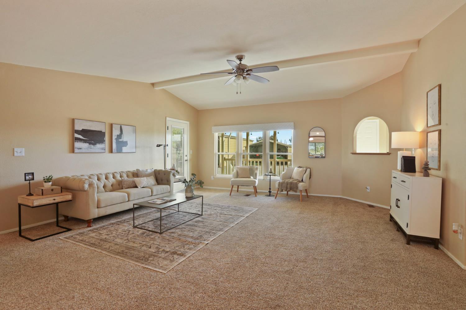3320 Durham Ferry Road Tracy, CA 95304 - Photo 28 of 77 a living room with furniture and white walls