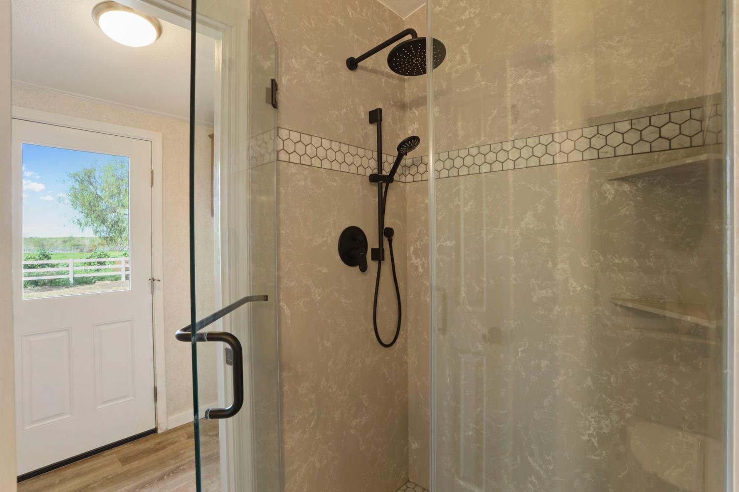 3320 Durham Ferry Road Tracy, CA 95304 - Photo 31 of 77 a bathroom with a shower