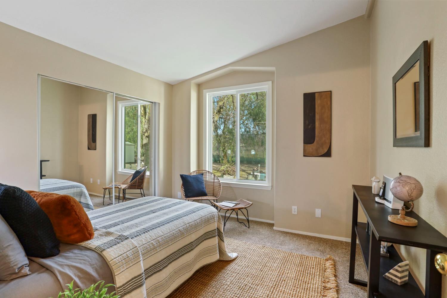 3320 Durham Ferry Road Tracy, CA 95304 - Photo 32 of 77 a bedroom with a bed and a window