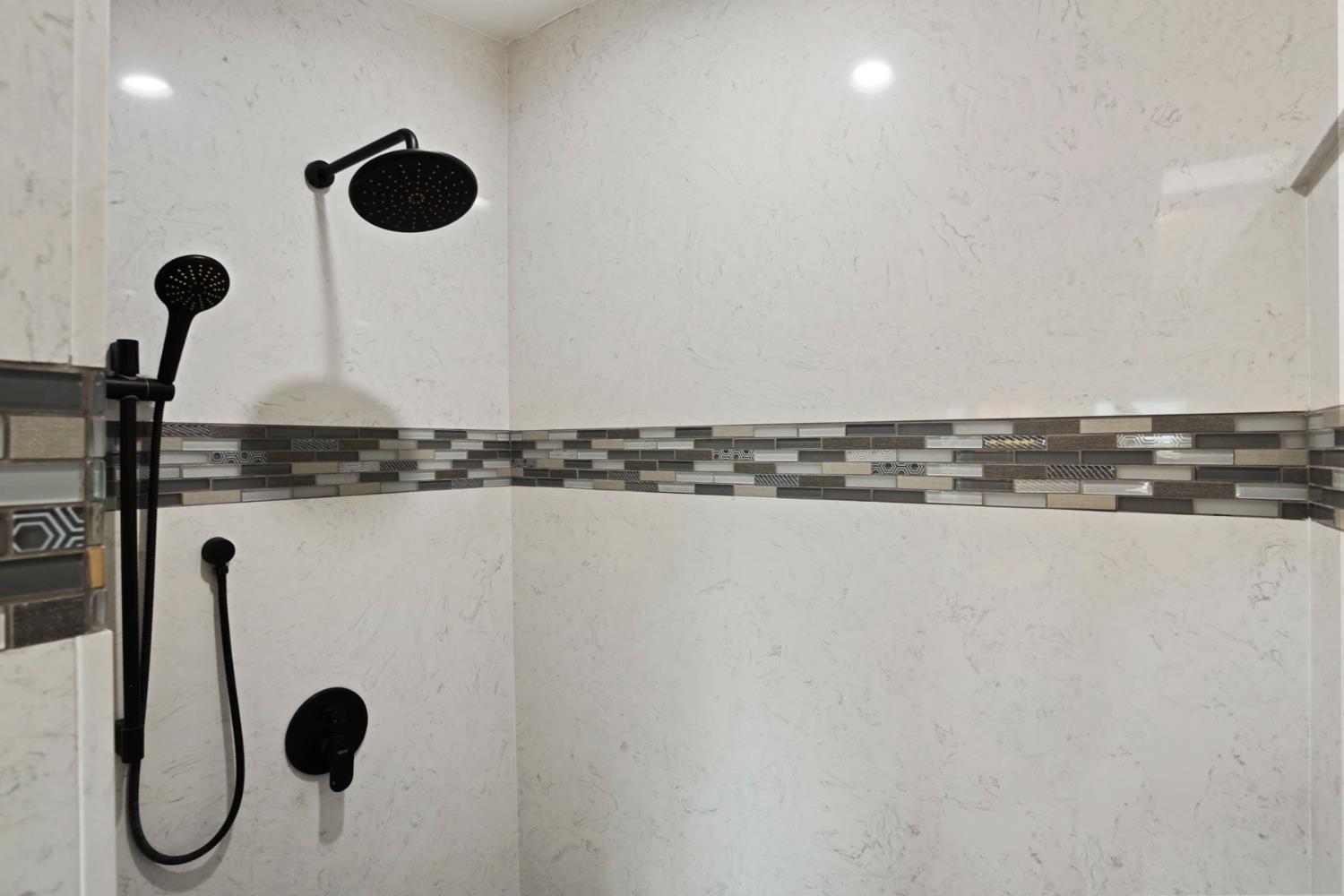 3320 Durham Ferry Road Tracy, CA 95304 - Photo 41 of 77 a close view of light fixtures and tap