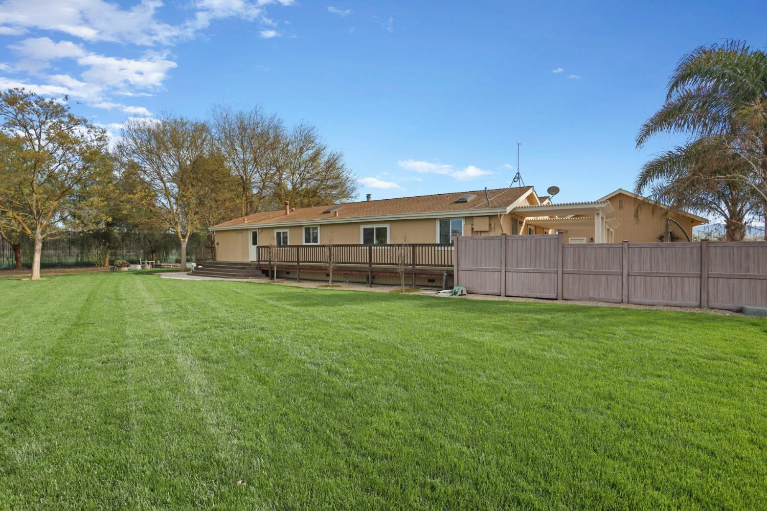 3320 Durham Ferry Road Tracy, CA 95304 - Photo 49 of 77 a view of a backyard with a garden and entertaining space