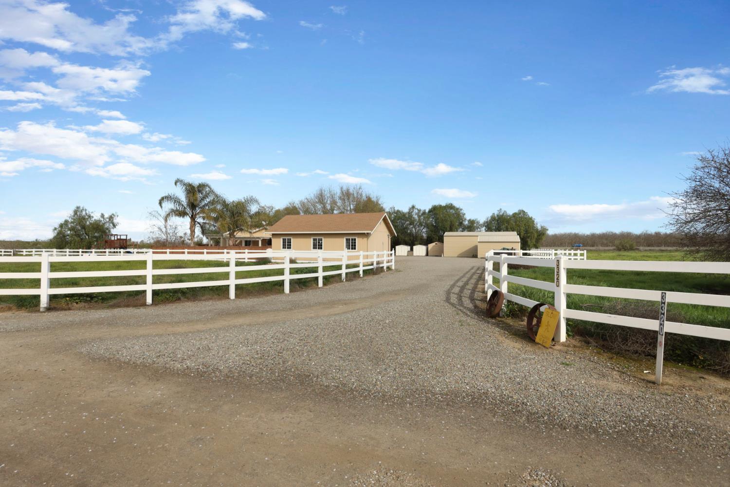 3320 Durham Ferry Road Tracy, CA 95304 - Photo 56 of 77 a view of a lake with outdoor space