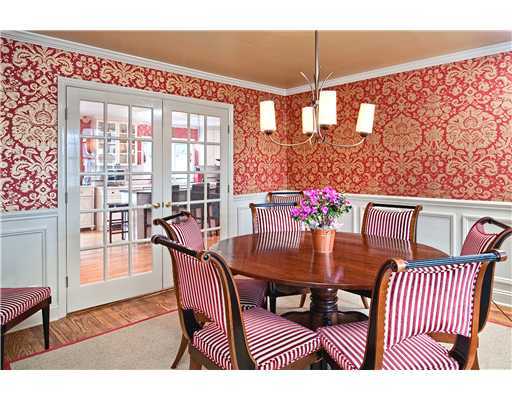 Undisclosed Address Darien, CT 06820 - Photo 5 of 9 a view of a dining room with furniture window and outside view