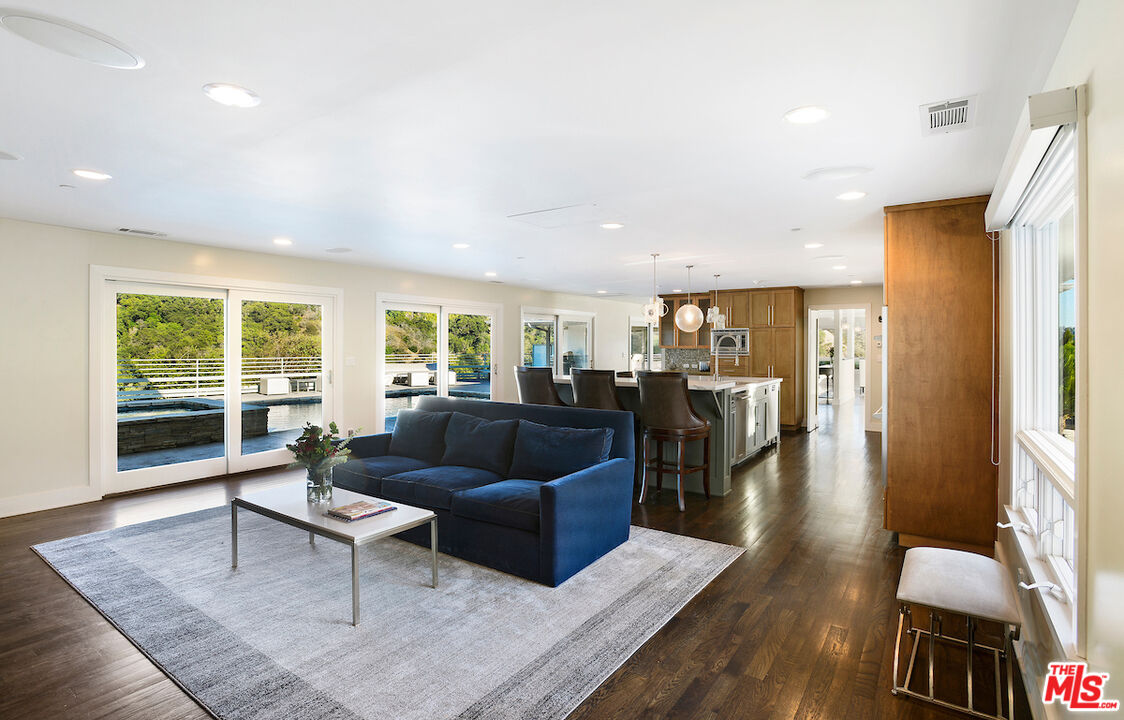 2547 Hutton Drive Beverly Hills, CA 90210 - Photo 9 of 27 a living room with furniture and wooden floor