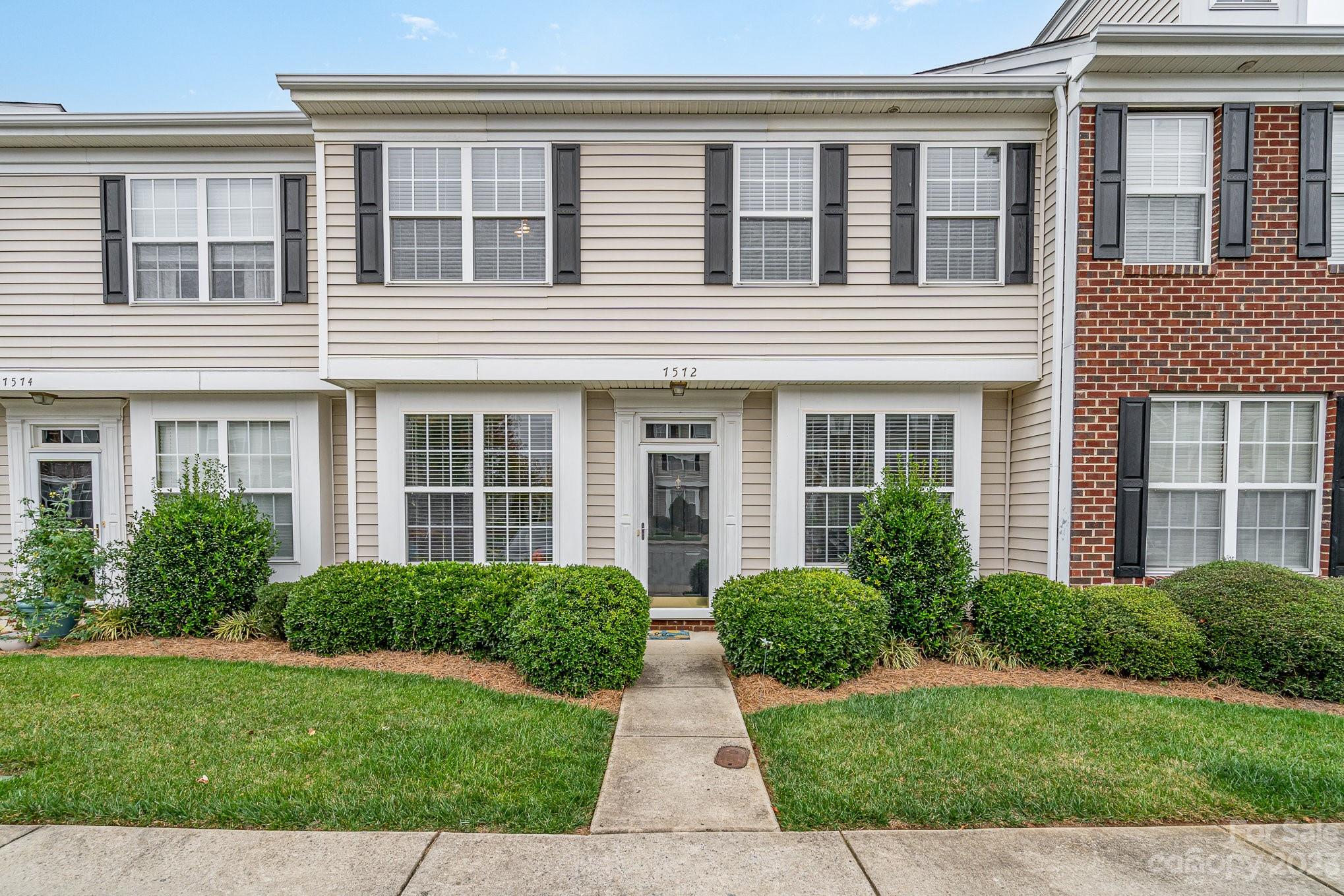 front view of house with a yard