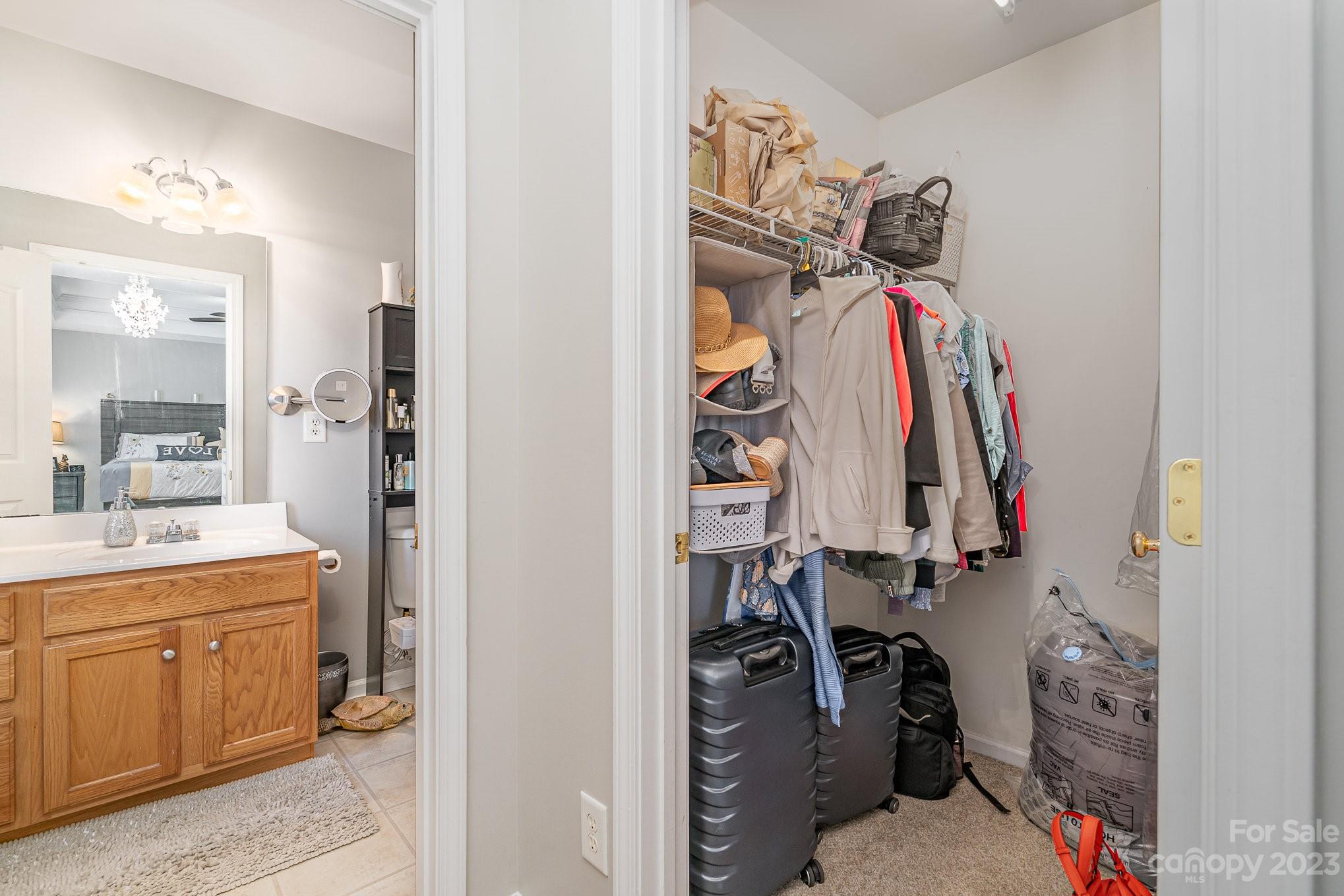 7572 Bluff Point Lane Denver, NC 28037 - Photo 21 of 33 a view of a walk in closet