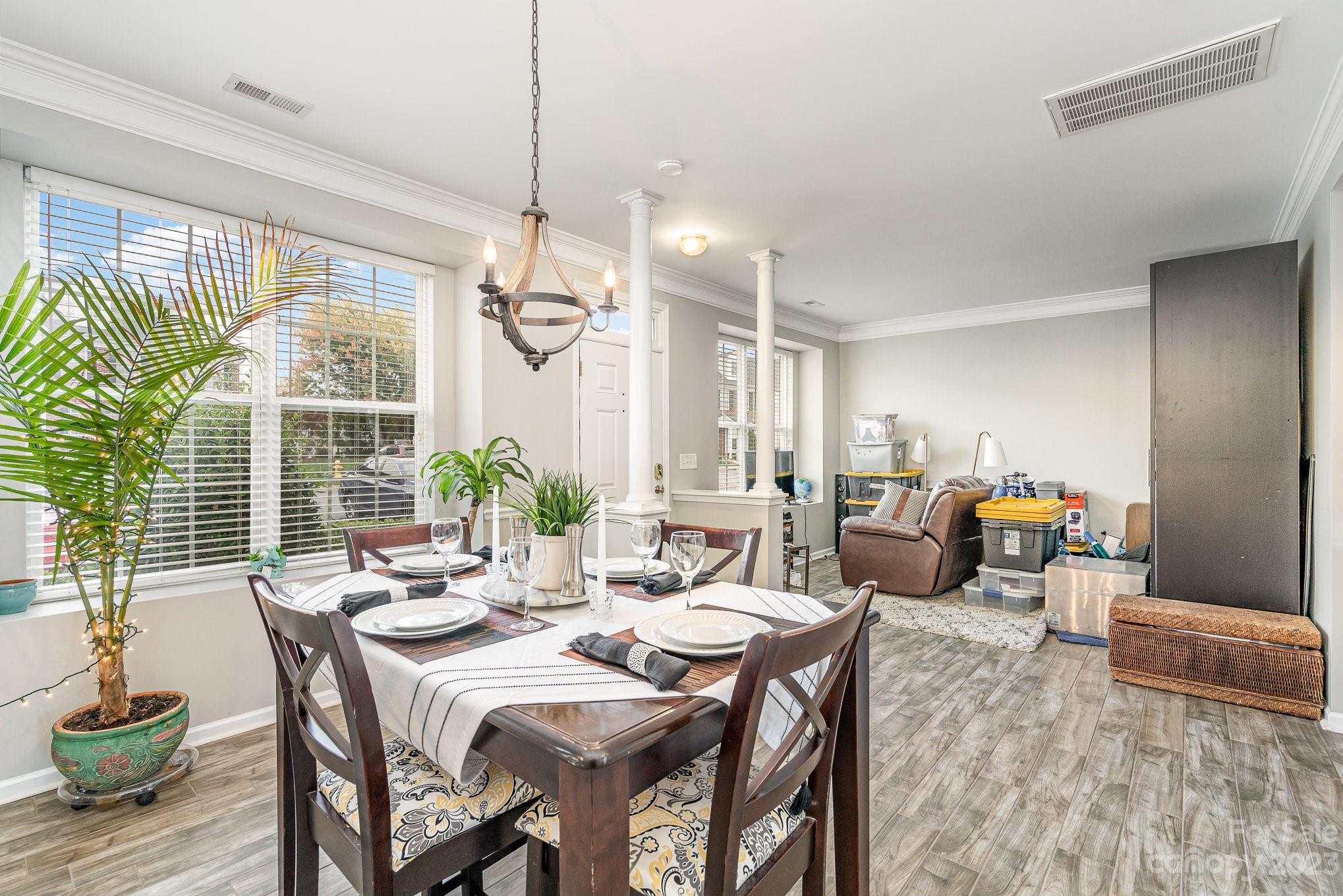 7572 Bluff Point Lane Denver, NC 28037 - Photo 6 of 33 a view of a dining room with furniture window and outside view