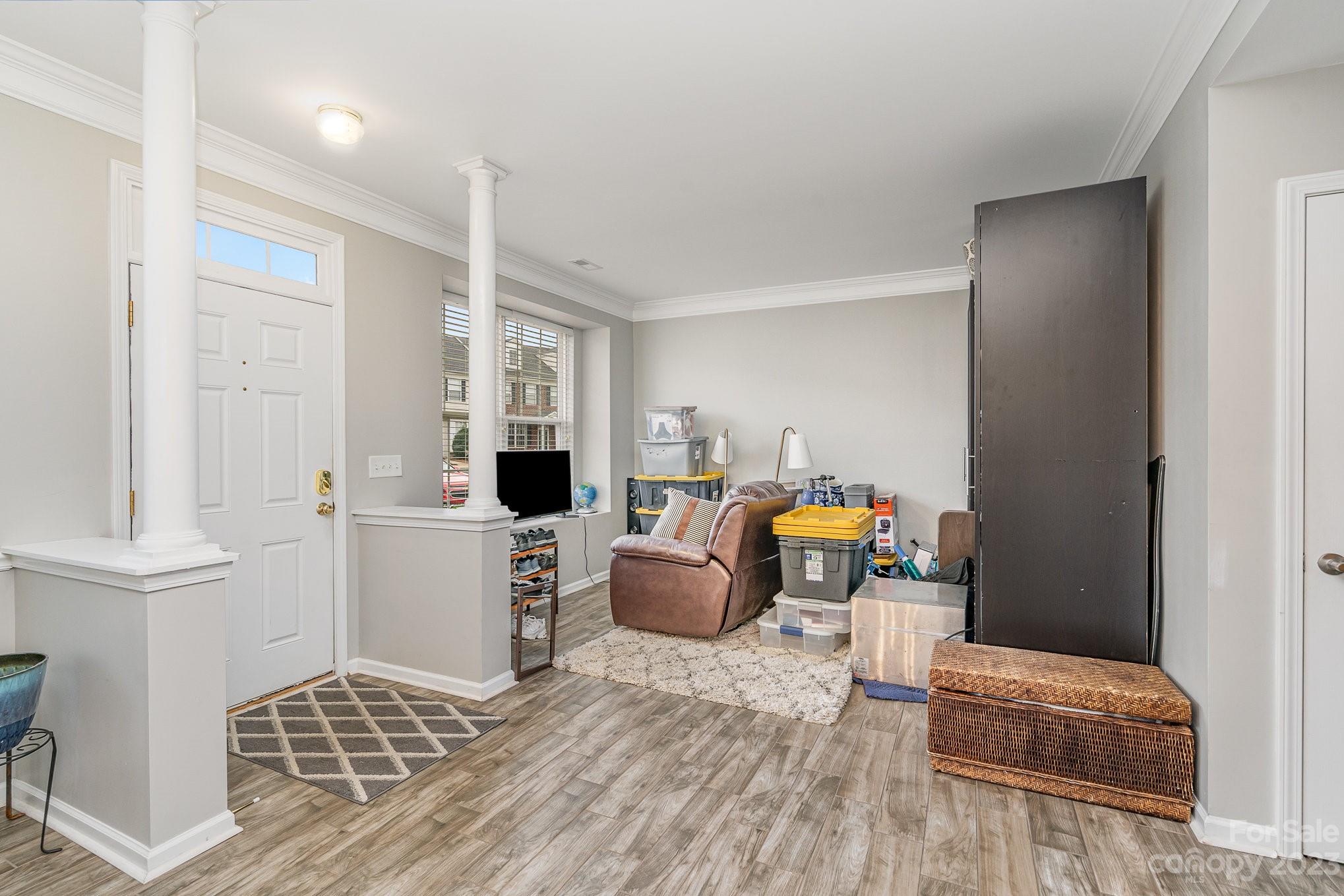 7572 Bluff Point Lane Denver, NC 28037 - Photo 7 of 33 a living room with furniture and a table