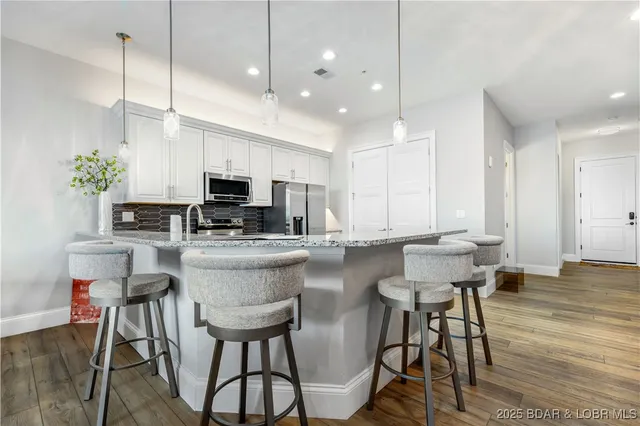 $855,000 | 166 Captiva Drive, Unit 8B, Sunrise Beach, MO 65079