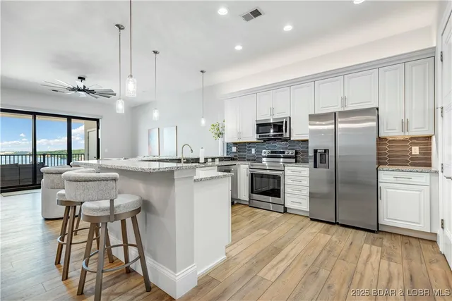 $855,000 | 166 Captiva Drive, Unit 8B, Sunrise Beach, MO 65079