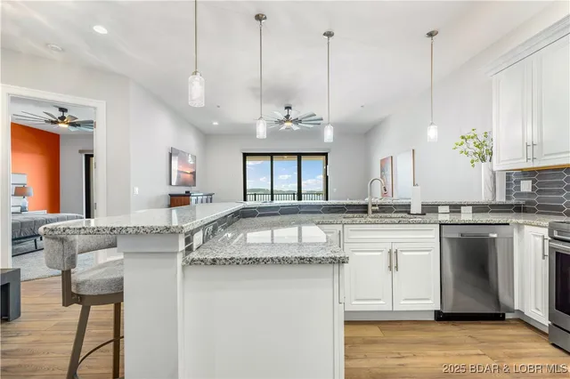 $855,000 | 166 Captiva Drive, Unit 8B, Sunrise Beach, MO 65079