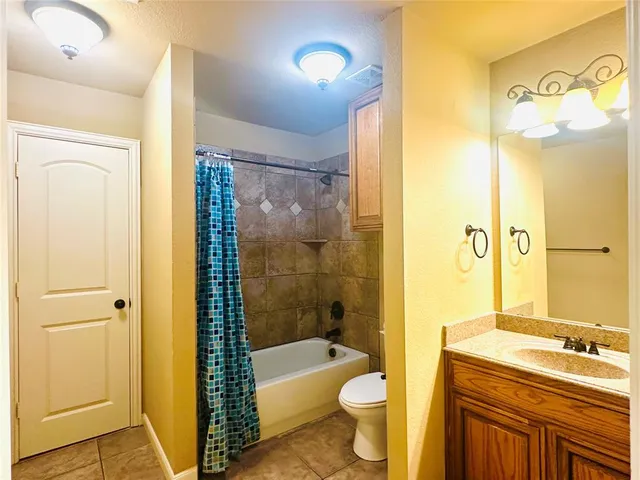 a bathroom with a sink toilet bathtub and shower