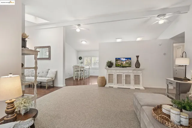 a bedroom with furniture and a wooden floor