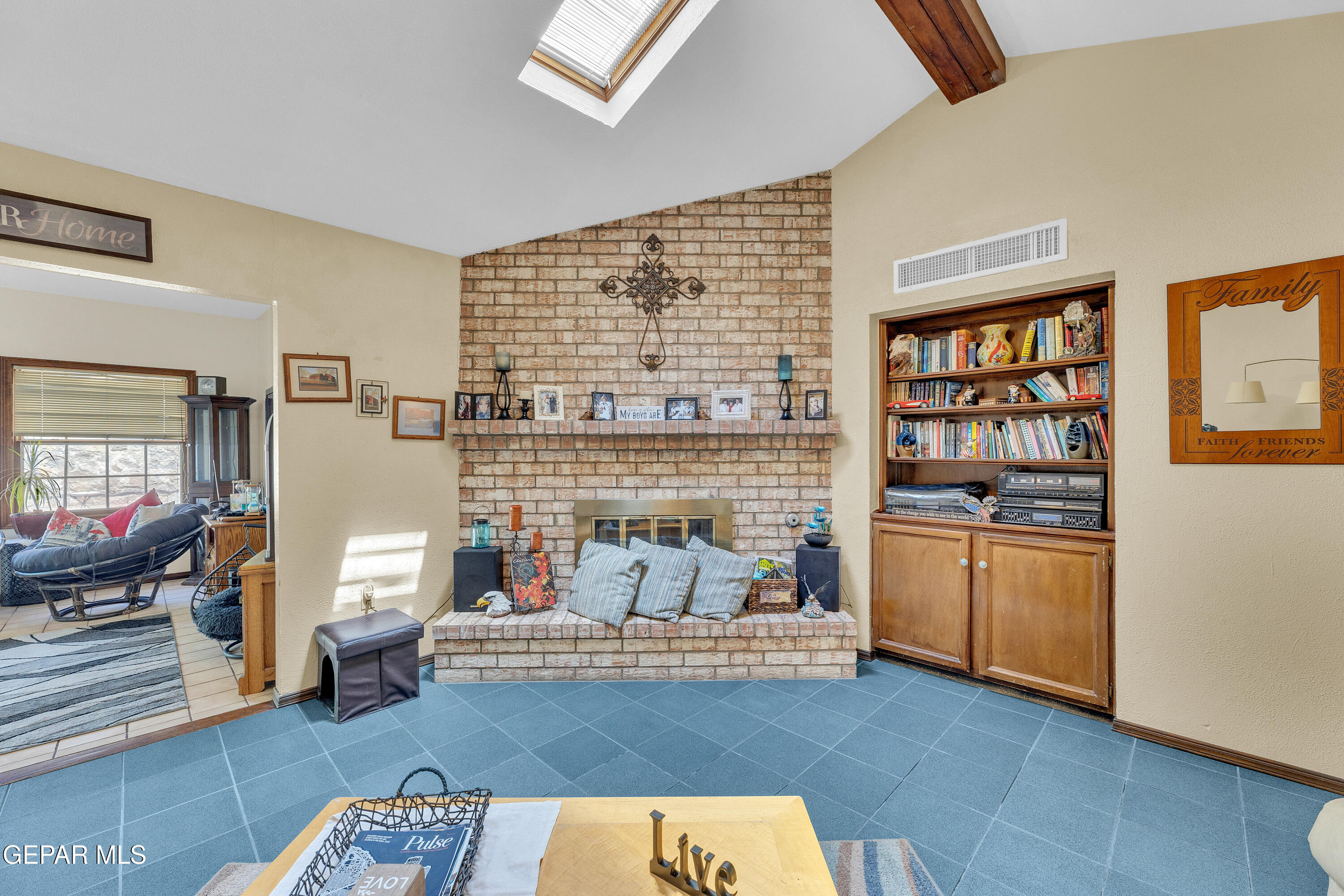 1664 Dick Ritter Street El Paso, TX 79936 - Photo 11 of 65 a living room with furniture and fireplace