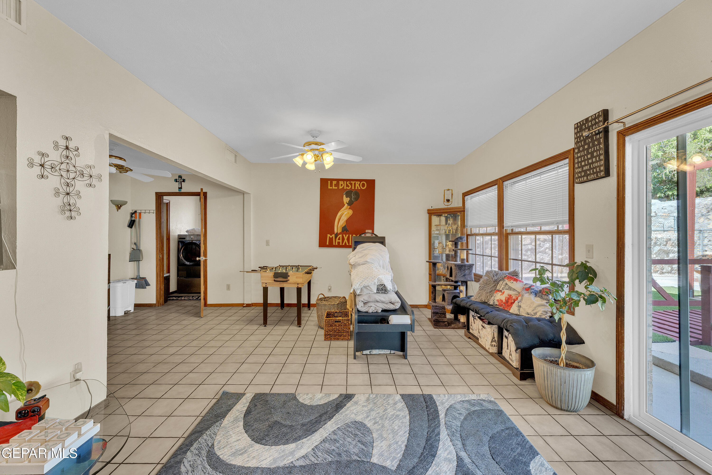 1664 Dick Ritter Street El Paso, TX 79936 - Photo 16 of 65 a living room with furniture and a large window