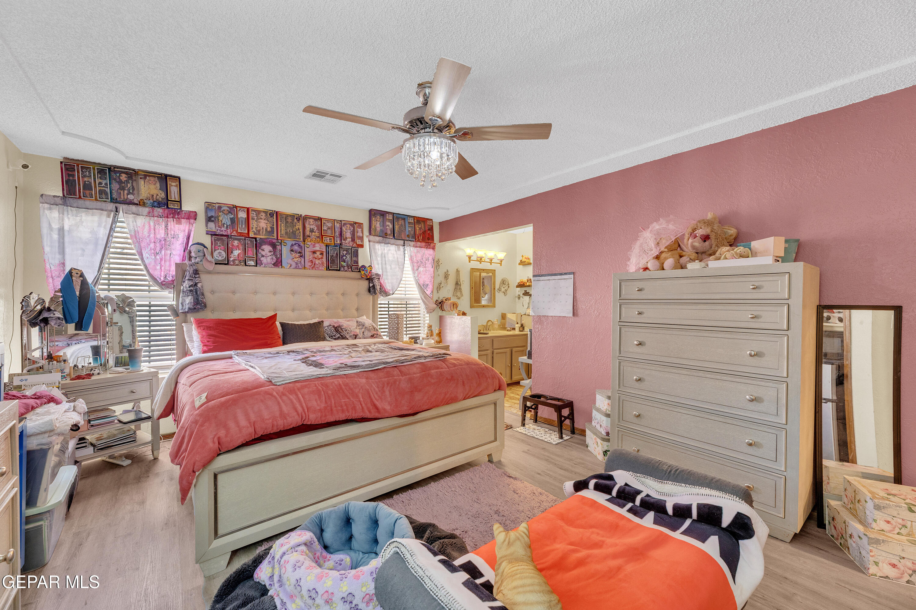 1664 Dick Ritter Street El Paso, TX 79936 - Photo 33 of 65 a bedroom with a bed and a closet