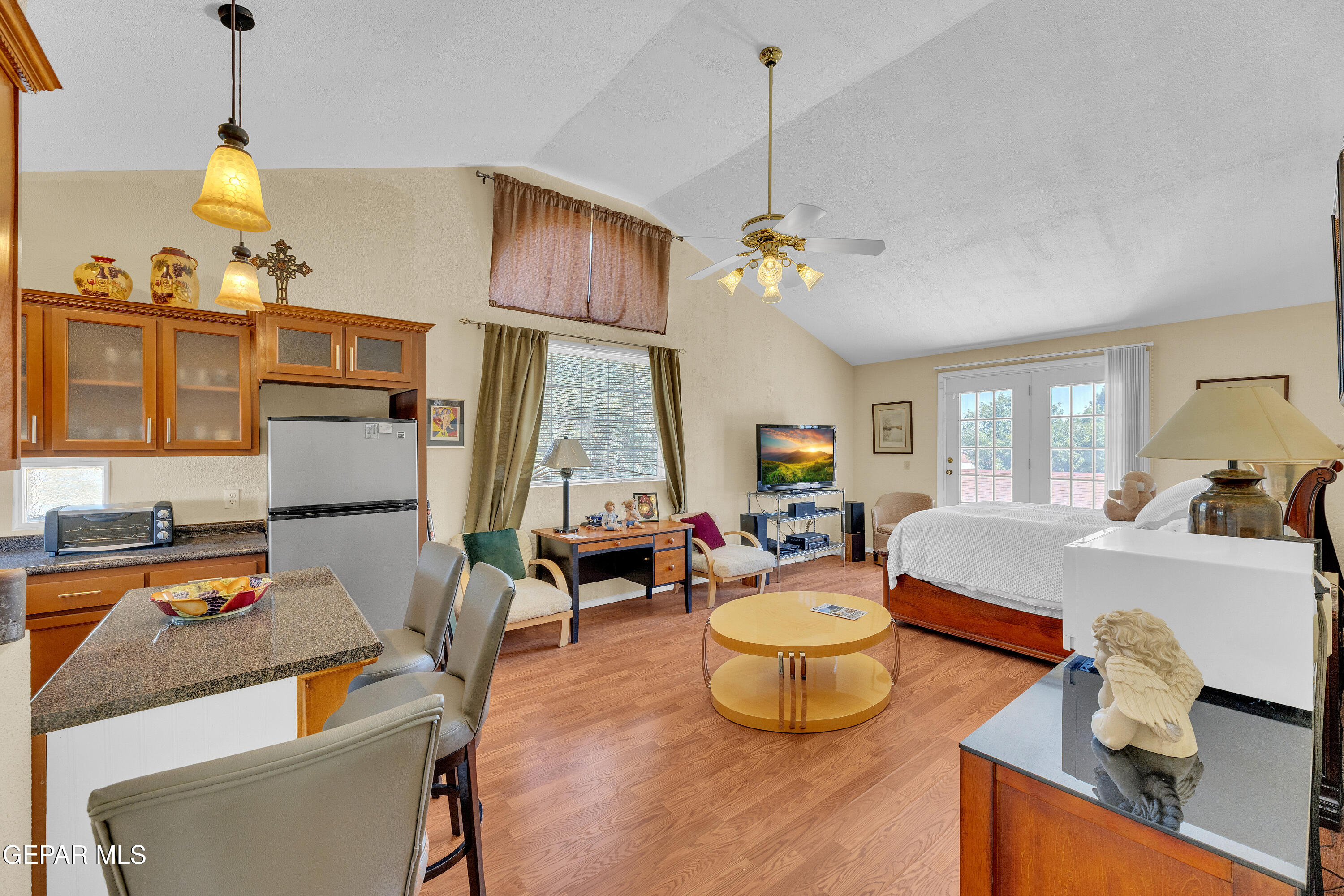 1664 Dick Ritter Street El Paso, TX 79936 - Photo 38 of 65 a living room with furniture and a table