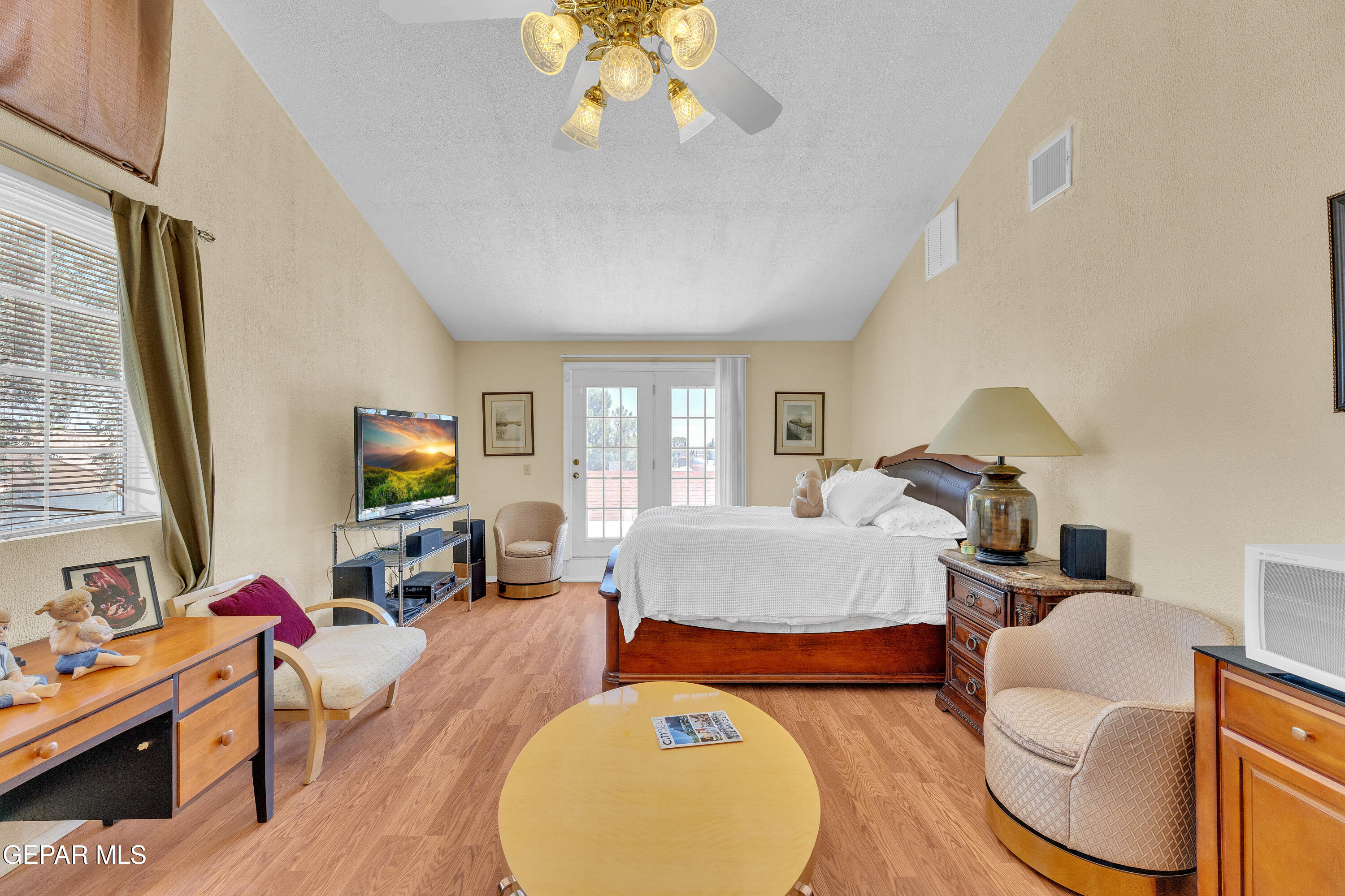 1664 Dick Ritter Street El Paso, TX 79936 - Photo 40 of 65 a living room with furniture a couch and a flat screen tv
