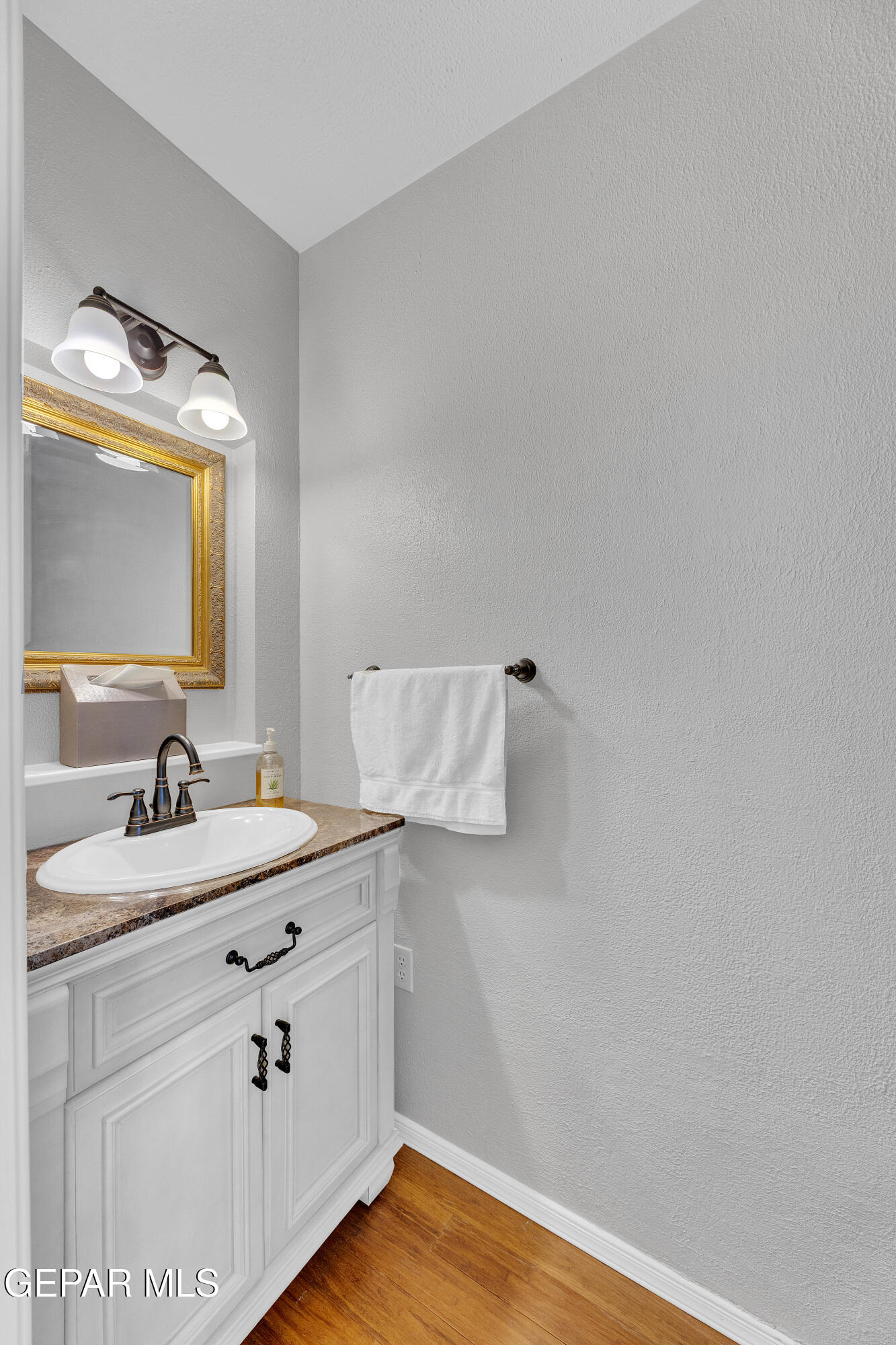 1664 Dick Ritter Street El Paso, TX 79936 - Photo 46 of 65 a bathroom with a sink and a mirror
