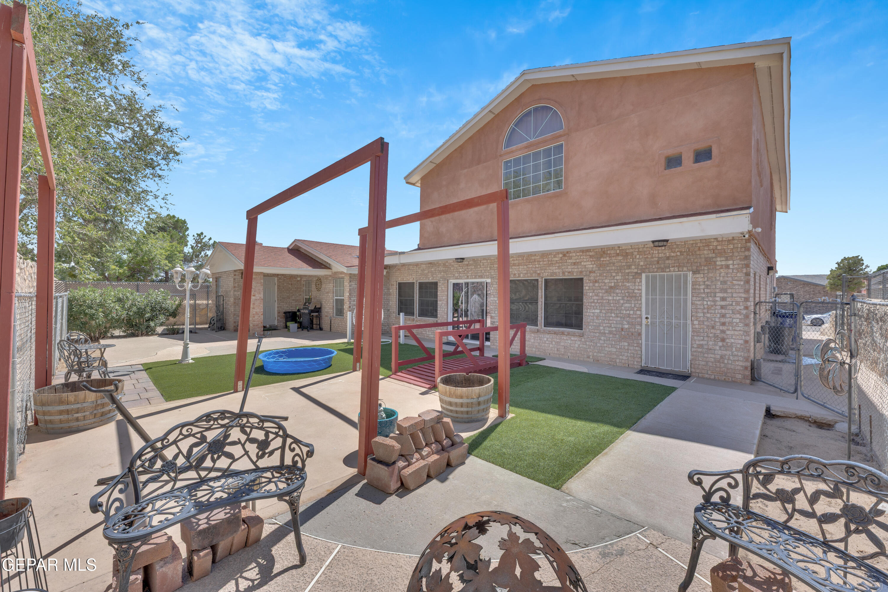 1664 Dick Ritter Street El Paso, TX 79936 - Photo 59 of 65 a front view of a house with garden