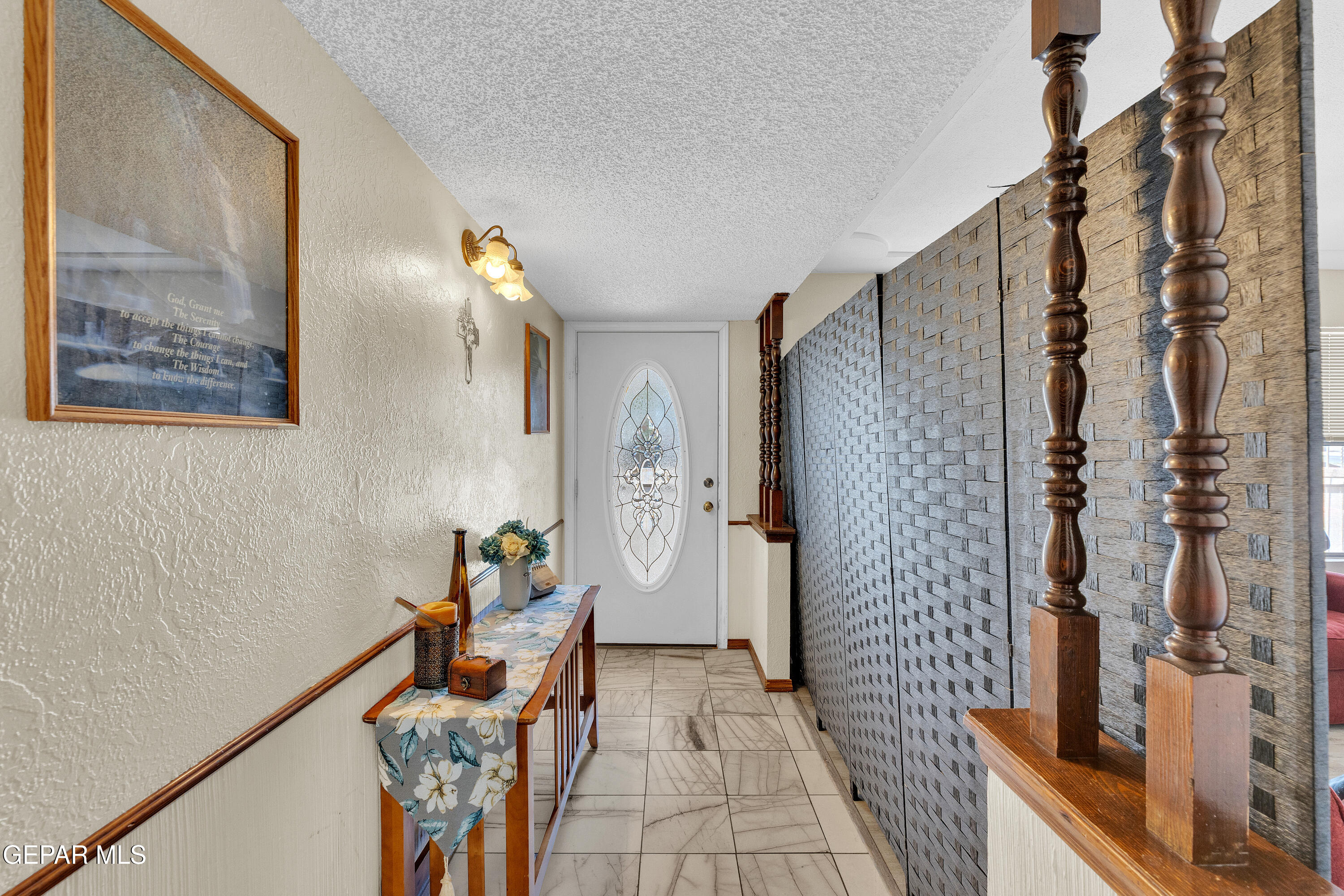 1664 Dick Ritter Street El Paso, TX 79936 - Photo 9 of 65 a living room with furniture and a chandelier