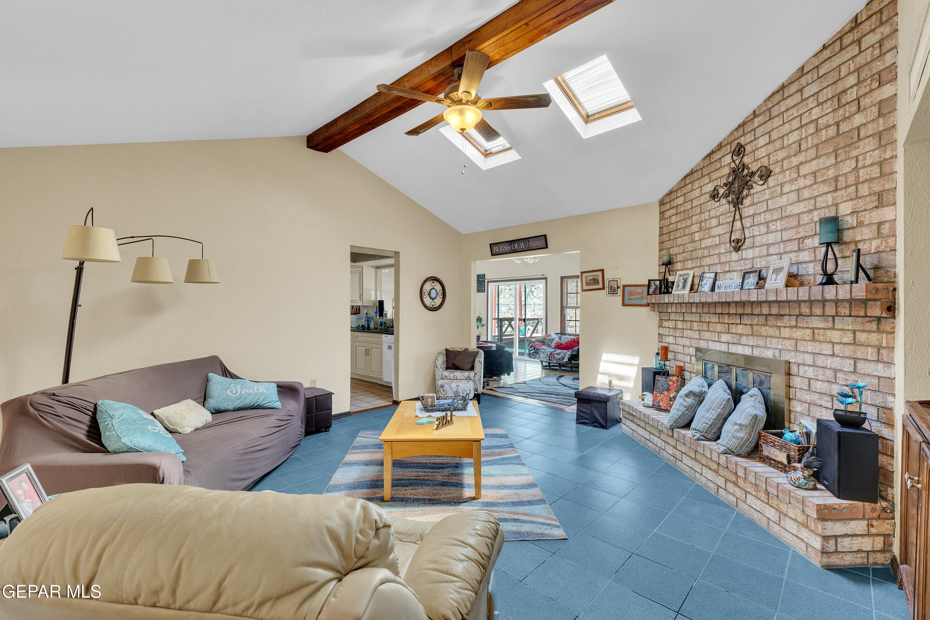 1664 Dick Ritter Street El Paso, TX 79936 - Photo 10 of 65 a living room with furniture and a fireplace