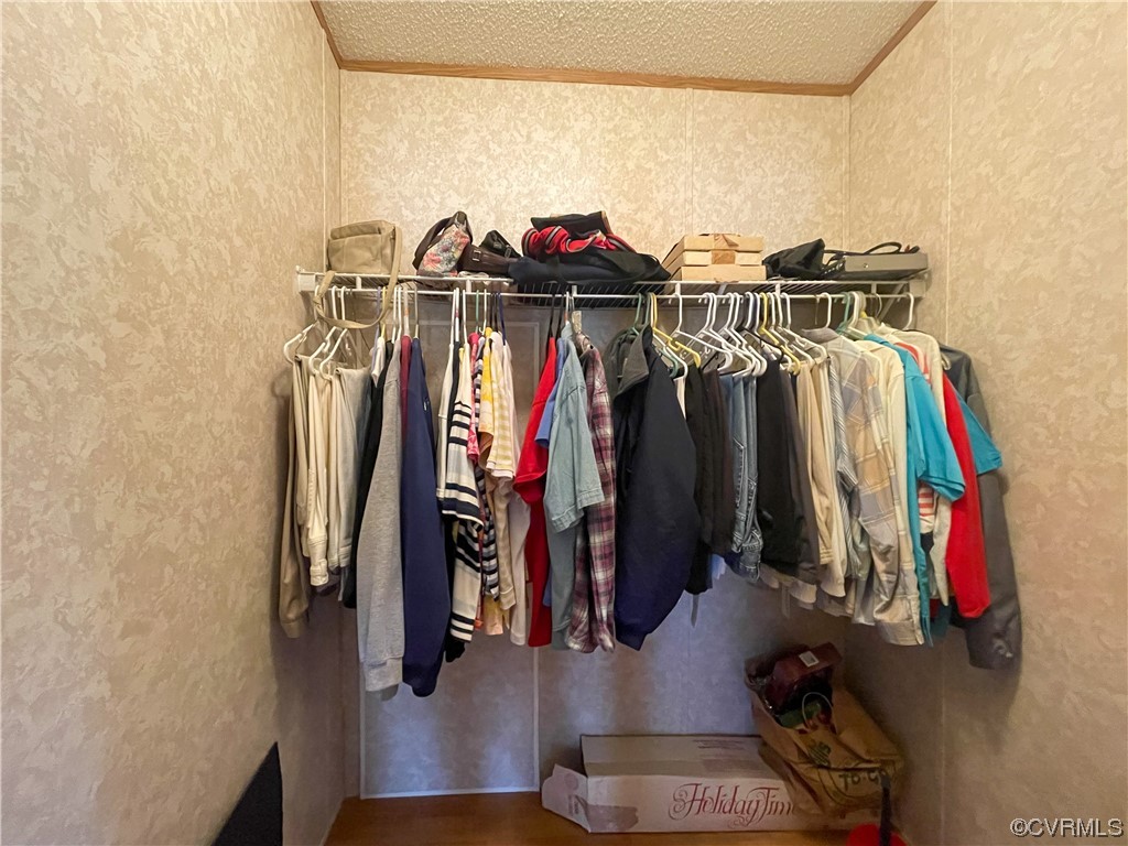 2950 Old Poole Road Alberta, VA 23821 - Photo 12 of 19 a view of walk in closet with clothes and shoes