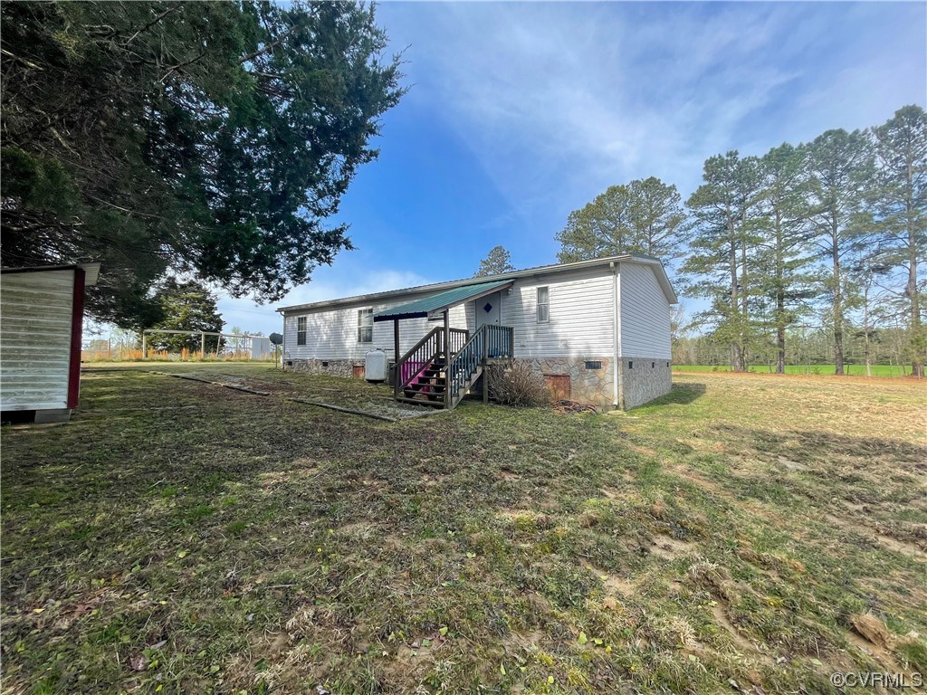 2950 Old Poole Road Alberta, VA 23821 - Photo 19 of 19 a view of a house with a yard