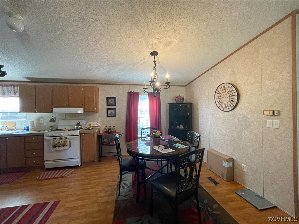 2950 Old Poole Road Alberta, VA 23821 - Photo 5 of 19 a kitchen with a table and chairs in it