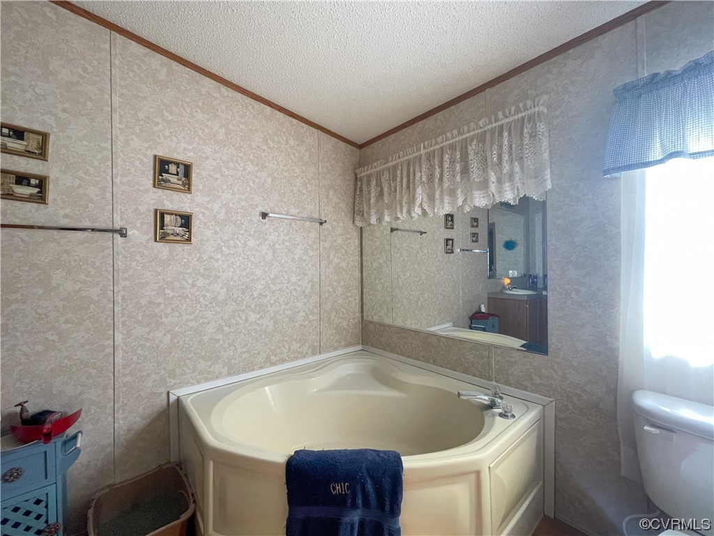 2950 Old Poole Road Alberta, VA 23821 - Photo 9 of 19 a bathroom with a tub a toilet and a shower