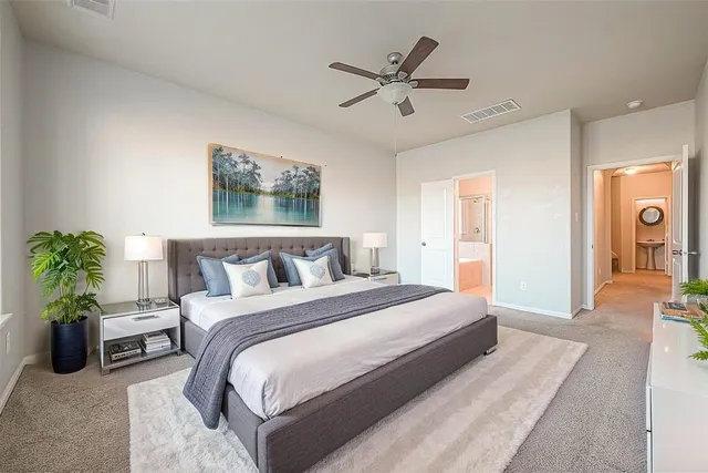 a bathroom with a tub sink and a mirror